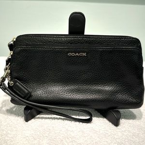 Black leather Coach Wristlet with built in wallet. Double zipper.